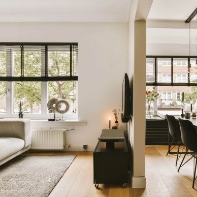 Studio apartment interior with wooden furniture