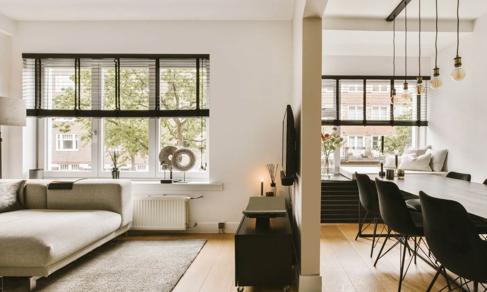 Studio apartment interior with wooden furniture