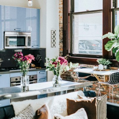 Studio apartment with a kitchen and a couch
